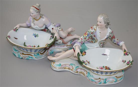 A pair of Meissen figural sweetmeat dishes, 19th century, length approx. 28cm, both with losses and slight restorations